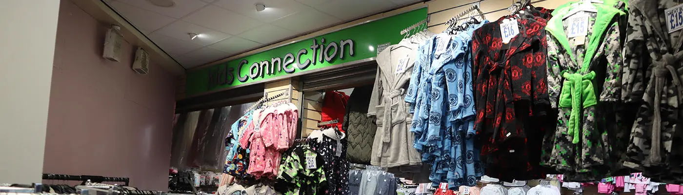 Racks of children's dressing gowns