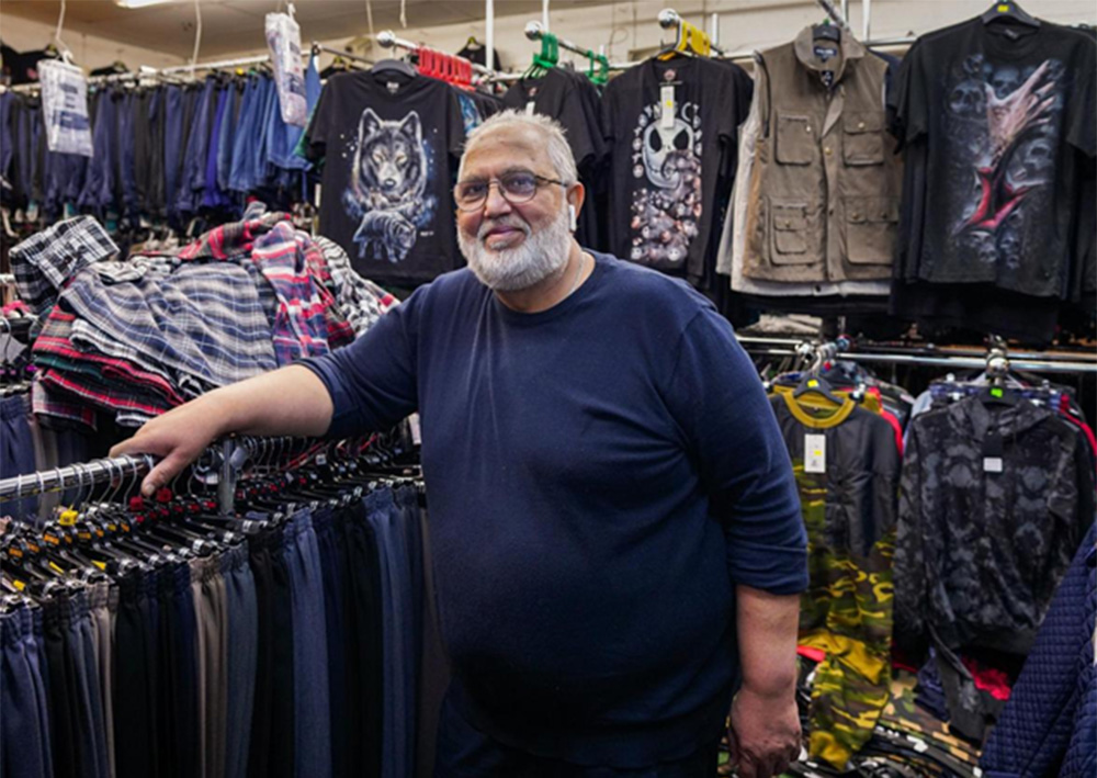 Man stood in a clothes shop